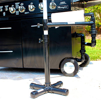 The Grillbrella is a great grilling accessory. Shown with paper towel holder.